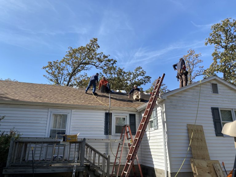 Lake Sallateeska Work Day 2020. We had people working on the roof and people picking up trash! Such amazing volunteers!