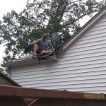 Steeleville BC helping us rip of shingles on the office! Such amazing volunteers!!