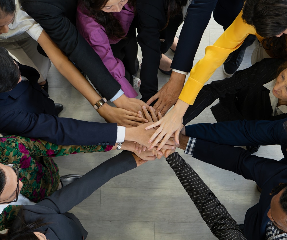 Hands connecting teamwork